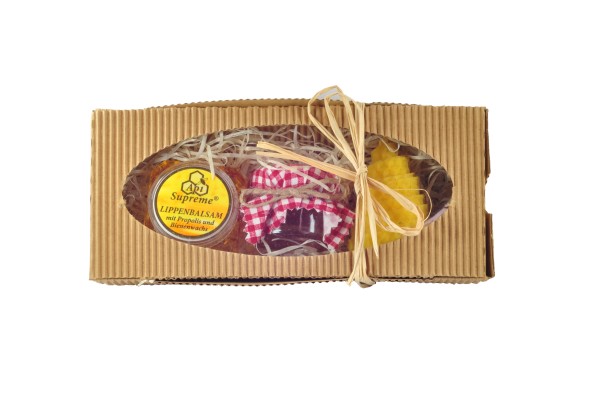 Gift box of mini honey, lip balm and candle