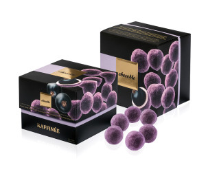 Lyophilized black currants in white chocolate with blueberry yogurt