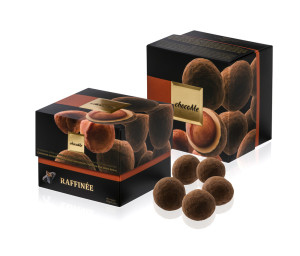 Macadamia nut in blonde chocolate with Tonka beans in cocoa powder