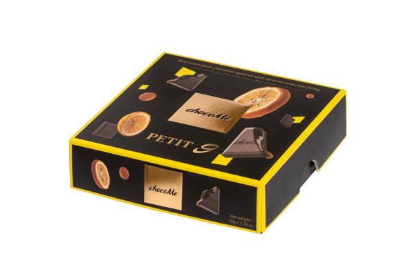 Mini dark chocolate squares filled with caramel and yuzu