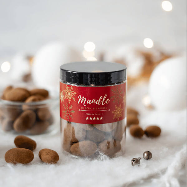 A jar of almonds in milk chocolate and cinnamon