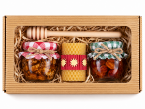 Set of two types of honey with a candle and lemon balm, in a corrugated cardboard box. - Reklamnepredmety