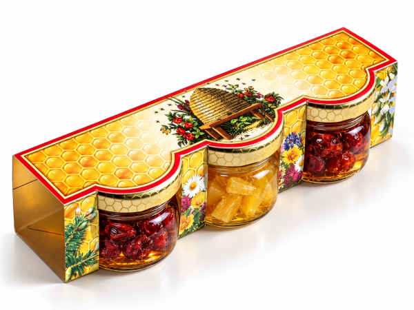 Set of dried fruit in honey in a printed cardboard box