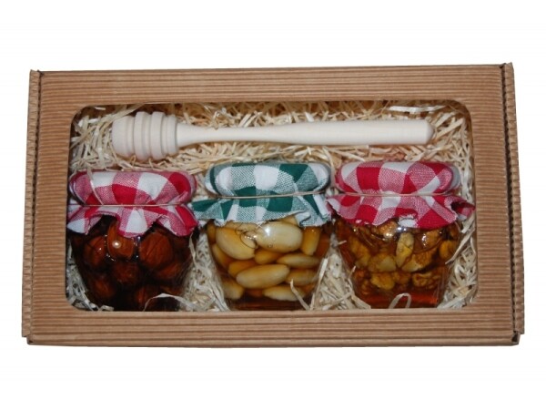 Set of 3 types of nuts in honey with lemon balm, in a corrugated cardboard box.