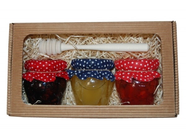 Set of 3 types of dried fruit in honey with lemon balm, in a corrugated cardboard box.