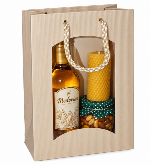 Set containing nuts in honey, a candle, and mead in a gift bag - Reklamnepredmety