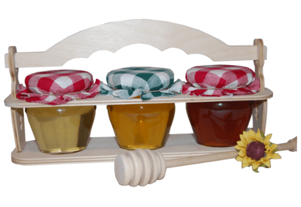 Set of 3 types of honey in a stand
