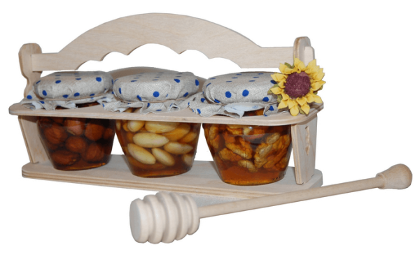 Set of 3 types of nuts in honey in a rack