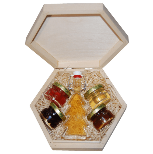 2 types of honey, nuts and dried cranberries in honey with mead in a hexagonal box with a closable lid