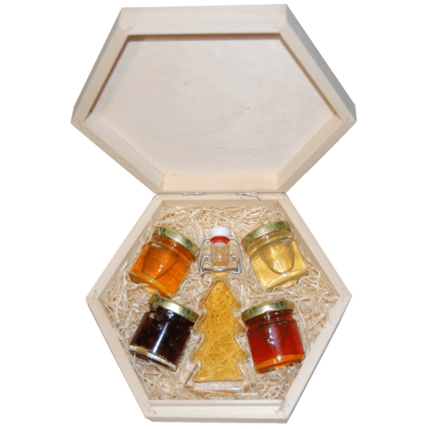 2 types of honey, nuts and dried cranberries in honey with mead in a hexagonal box with a closable lid