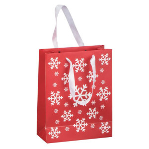A small paper Christmas gift bag