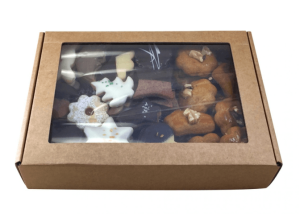 Butter gingerbread with walnut, cardboard box