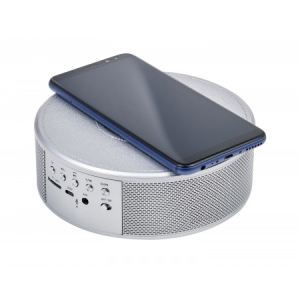 Wireless speaker with charging station