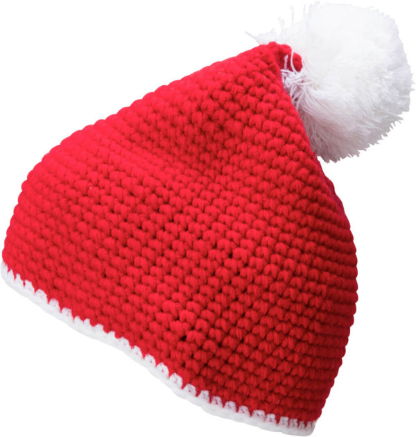 Crocheted hat with contrasting border and pompon