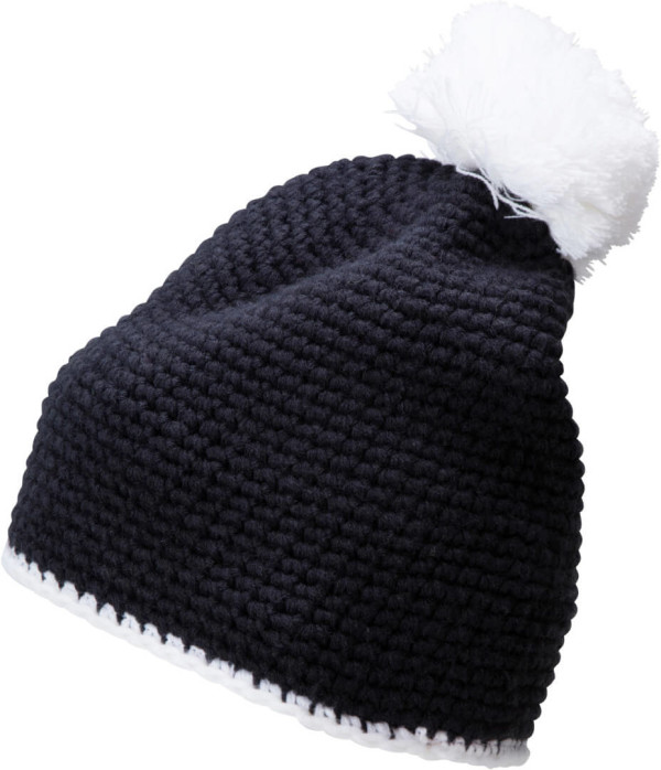 Crocheted hat with contrasting border and pompon