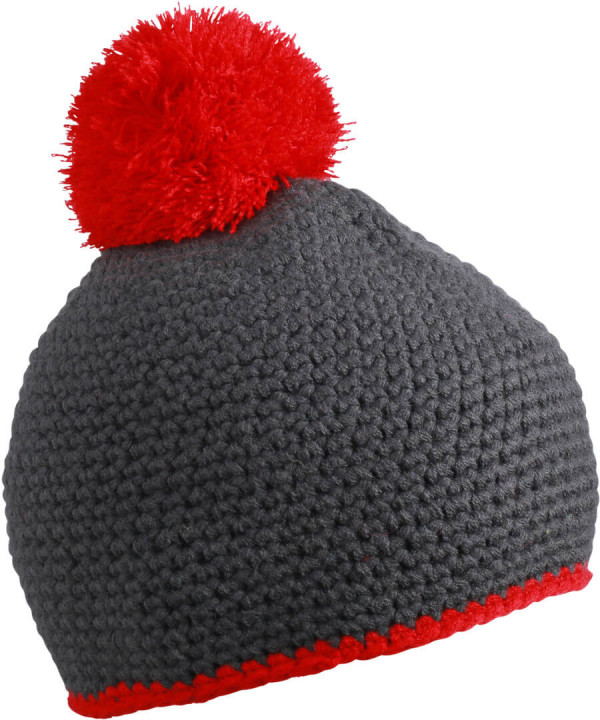 Crocheted hat with contrasting border and pompon